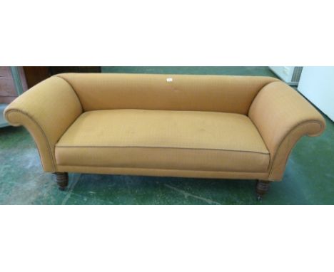 A late Victorian Chesterfield sofa on turned legs. 72' long