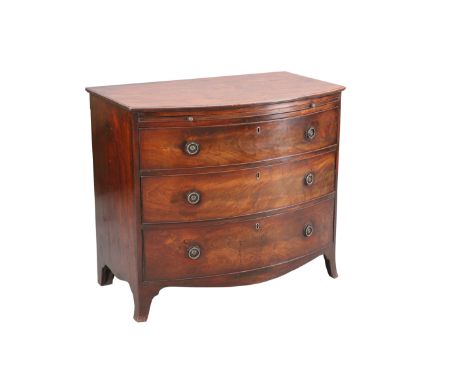 A REGENCY MAHOGANY BOW-FRONT CHEST OF DRAWERS, the moulded top above a slide over three long graduated drawers, raised on spl