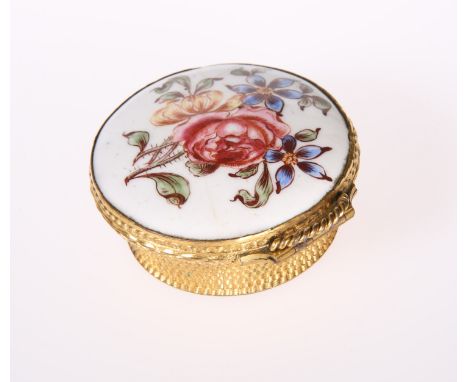 AN ENAMEL AND GILT-METAL SNUFF BOX OF PANIER TYPE, LATE 18TH CENTURY,&nbsp;circular with ropetwist thumbpiece above the hinge