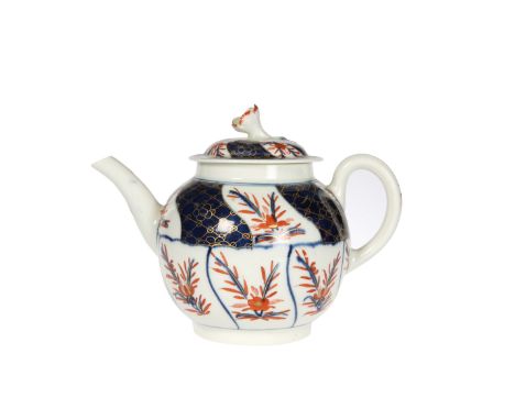 A WORCESTER PORCELAIN BULLET-FORM TEAPOT, THIRD QUARTER 18th CENTURY, decorated in panels of blue scale and iron red with flo