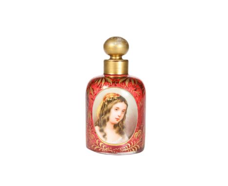 A 19TH CENTURY RUBY GLASS SCENT BOTTLE, with hand-painted oval "cameo" portrait of a girl, the ground gilded with foliage. 12