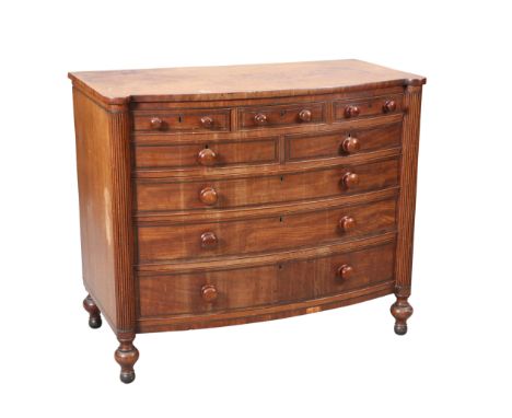 A SCOTTISH MAHOGANY BOW-FRONT CHEST OF DRAWERS, SECOND QUARTER OF 19TH CENTURY, with reeded half columns flanking three short