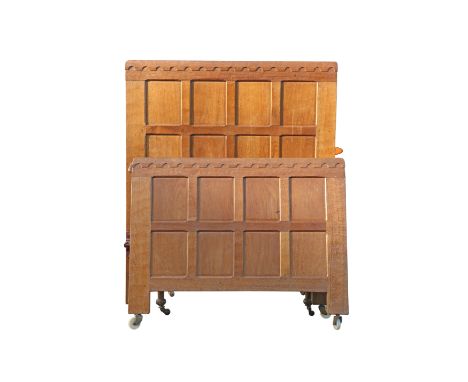 ROBERT THOMPSON OF KILBURNA MOUSEMAN OAK SINGLE BED, the panelled headboard and footboard with penny moulded crest, mouse sig