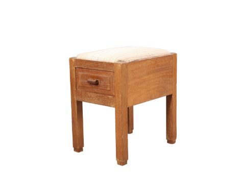 A COTSWOLD SCHOOL LIMED WALNUT BOX STOOL, fitted with two drawers and raised on square section legs. 40.5cm wide