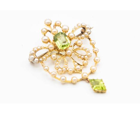 A LATE VICTORIAN SEED PEARL AND PERIDOT BROOCH, the delicate bow detail mount set throughout with graduating seed pearl with 