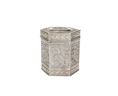 A CHINESE SILVER TEA CADDY, c. 1900, of hexagonal form, chased with panels of leaves within geometric bands, stamped marks in