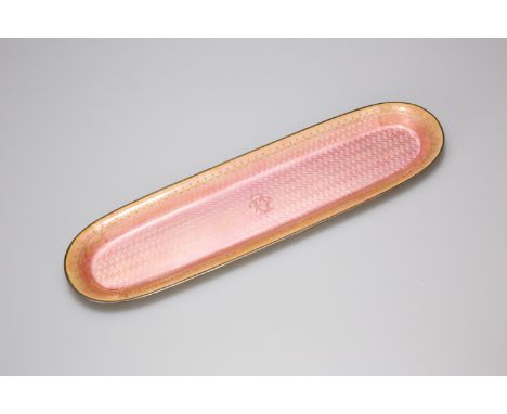 A DAVID ANDERSEN SILVER AND ENAMEL PEN TRAY, of rounded rectangular form, the pink guilloche enamel ground centred by a monog