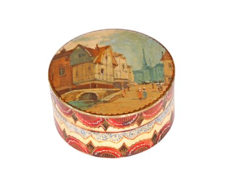 A CONTINENTAL VERNIS MARTIN HAND PAINTED IVORY SNUFF BOX, c. 1800, circular, the cover decorated with a Northern European tow