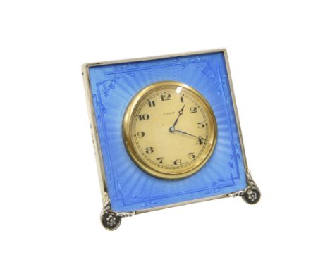 A GEORGE V SILVER AND BLUE ENAMEL DESK CLOCK, RICHARD COMYNS, LONDON 1928, the square frame enclosing an engine turned and fo