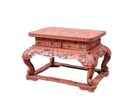 A CHINESE RED LACQUER STAND, the rectangular top carved with a panel of pheasant in a landscape against a ground of dense lea