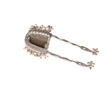 A MALAYSIAN SILVER (TESTED) BETEL NUT CRACKER, with engraved decoration and pendant spheres. 15cm