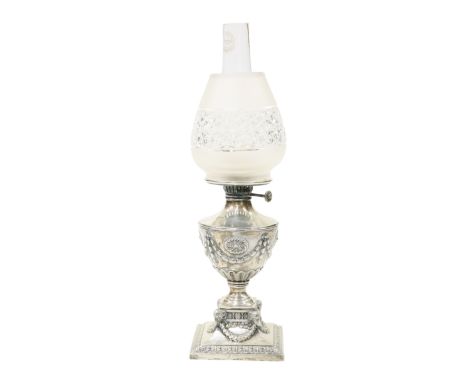 A LATE VICTORIAN SILVER OIL LAMP, Martin Hall &amp; Co., Sheffield 1892, the square base cast with acanthus and swags over an