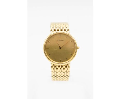 A GENTLEMAN'S 18CT GOLD ETERNA BRACELET WATCH.&nbsp;Circular gilt dial with gilt hands and baton index, signed Eterna, fitted