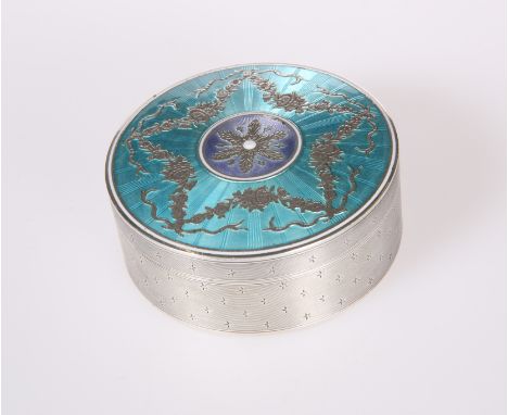 A FINE FRENCH SILVER AND ENAMEL BOX, 19TH CENTURY, circular, the turquoise enamelled cover applied with silver foliate swags 