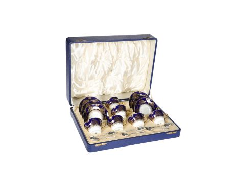 A CASED COALPORT PORCELAIN SIX-PIECE TEA SERVICE, decorated in cobalt blue and gilt with six electro-plated teaspoons.&nbsp;