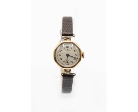 A LADY'S ROLEX STRAP WATCH. Circular silver dial with arabic index and black hands with seconds sub dial at 6 o'clock positio