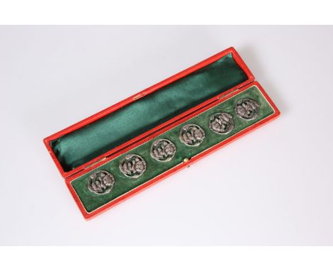 A SET OF SIX ART NOUVEAU SILVER BUTTONS, REYNOLDS &amp; WESTWOOD, BIRMINGHAM&nbsp;1906, pierced and&nbsp;embossed in low reli