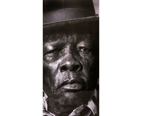 SEBASTIEN KRUGER (B.1963), JOHN LEE HOOKER, limited edition print, signed and numbered 3/99 in pencil, framed. Image 60cm by 