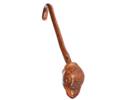 A NOVELTY CARVED STICK, c. 1900, the terminal carved with two comic grotesques and inscribed "For What you Receive May you be