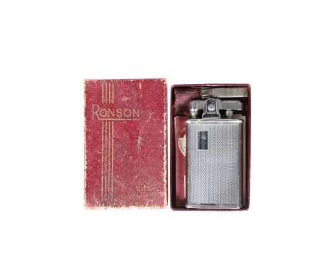 A VINTAGE RONSON LIGHTER, in original box with pouch and papers.
