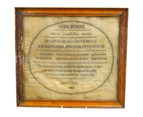 A Hannah Hack, York School, 1801 sampler, sewn within an embroidered black oval border, headed with York School above a row o
