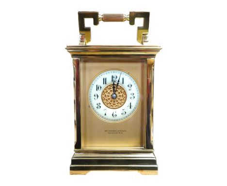A brass cased carriage clock, the dial inscribed Shepheard &amp; Company, no key, 18cm high. Condition - good, untested