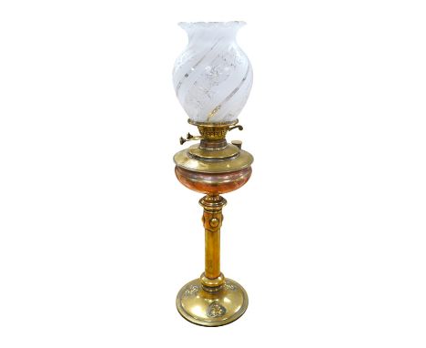 An English Arts and Crafts oil lamp with frosted acid etched shade, chimney, overall 74cm high. Condition – areas of old copp