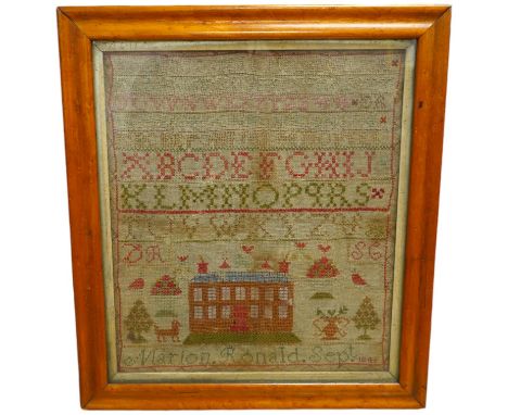 A 19th century sampler by Marion Ronald dated 1846, worked with various alphabets in cross stitch and buttonhole stitch, the 