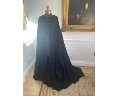 A men’s black heavy cotton cloak – with label Royal Opera House ‘Tannhauser’ – pilgrim character Hem frayed but no actual dam
