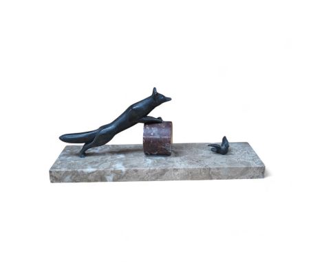 An Art Deco marble and spelter sculpture of a fox and dove, 29cm wide. Condition - fair