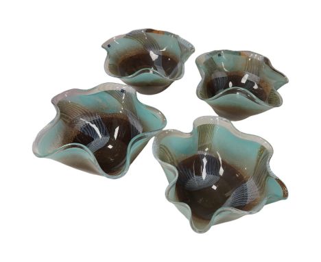 A set of four Svaja coloured art glass handkerchief bowls, 36cm in diameter. Condition - good