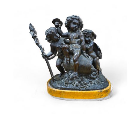 After Claude Michel Clodion (1738-1814), a bronze group of three Bacchanalian cherubs on sienna marble base, 31cm. Condition-