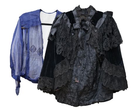 An Edwardian black velvet and black lace evening cape together with a purple chiffon and cream lined blouse labelled John Bar