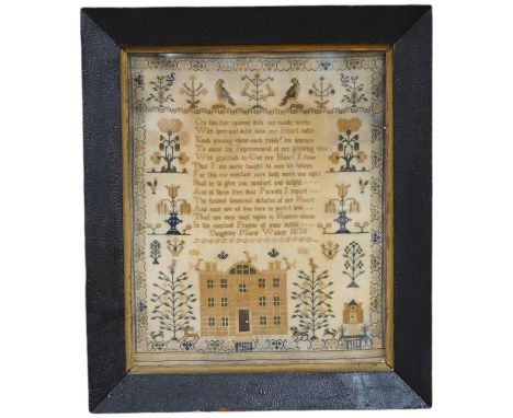 A framed 1835, dated sampler, embroidered by Mary Walker, worked in fine coloured silks, with a central verse and large three