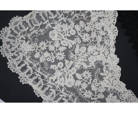 A small collection of late 19th century laces including a cream Brussels bobbin lace collar appliquéd on to net and two simil