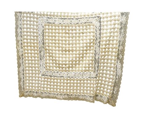 A late 19th early 20th century ‘YoYo’ puffy cream silk and cream bobbin lace quilt/bedcover, made with circles of silk, drawn