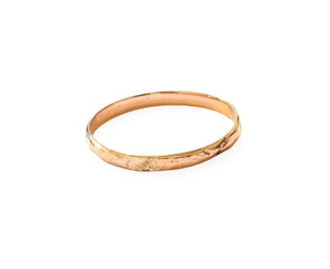 A 9 Carat Gold Bangle, inner diameter 7.4cm  Gross weight 10.3 grams.