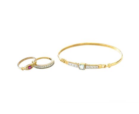 A 9 Carat Gold and Diamond Half Hoop Ring, finger size N1/2; A 9 Carat Gold Synthetic Ruby and Diamond Three Stone Ring, fing
