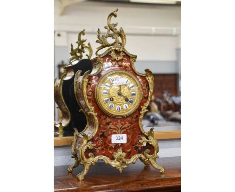 A French "Boulle" Striking Mantel Clock, circa 1900, tortoiseshell veneered and brass inlaid case, with applied gilt metal sc