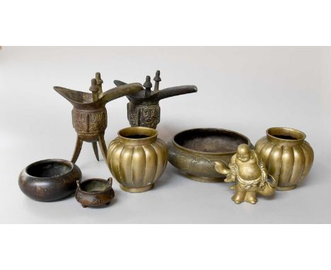 Two Chinese Bronze Archaic Style Tripod Censers, together with a similar pair of lobed brush pots, three various censers and 