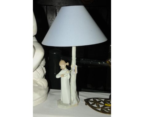 Nao figural table lamp 