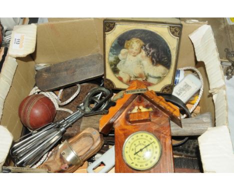 Box of tools, wooden shoe ornaments, cricket ball, axe, etc. 