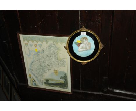 Print of putti in circular frame and map of Cumbria 