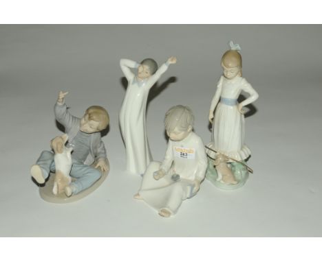 Four Nao ornaments 