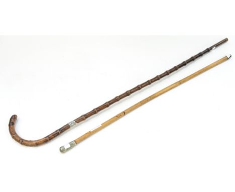 A Coldstream Guards swagger stick and a crook handle walking cane (2) 