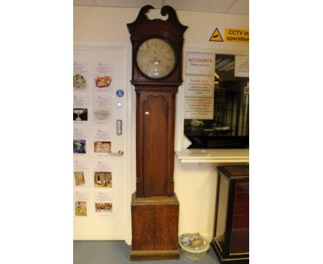 A George III oak cased longcase clock, attributable to Derby, the hood with a circular glazed door, mechanism in pieces and r