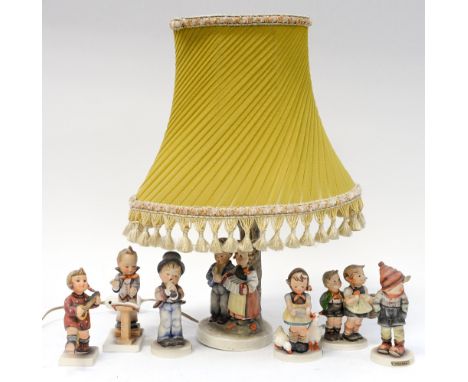 A Goebel lamp base, with six further Goebel figures (7) 
