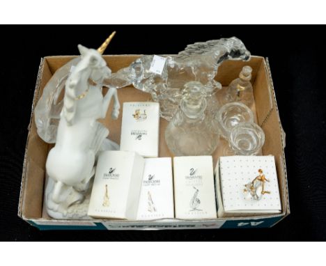 A collection of glassware including four boxed Swarovski Crystal Memories Classics, figures of musical instruments, a Mats Jo