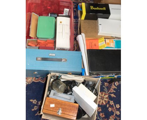 A large quantity of camera equipment cameras, boxes and slide box (4)