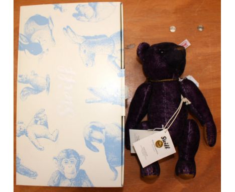 A boxed Steiff limited edition 'Monty' teddy bear, aubergine tipped mohair, growler, wears bell, no 983/1500, model no. 03573